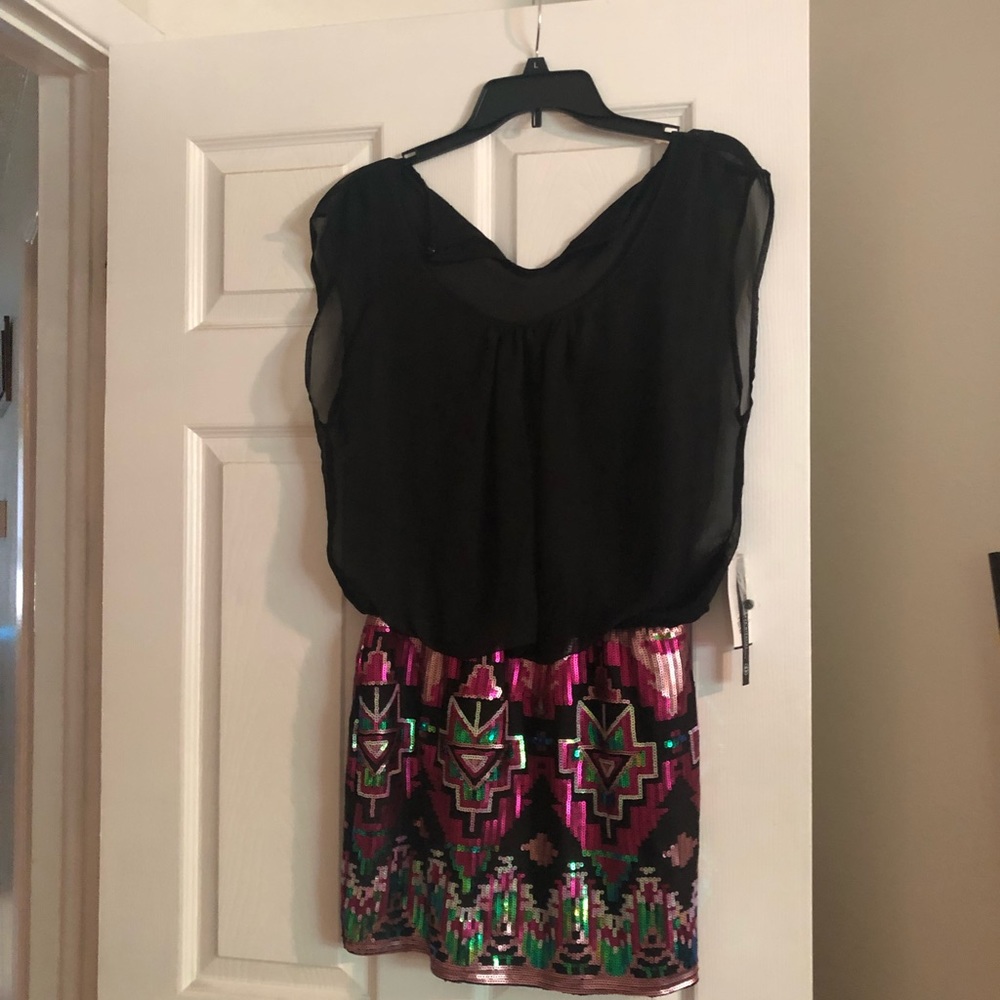 Dress with sequins on bottom sheet top